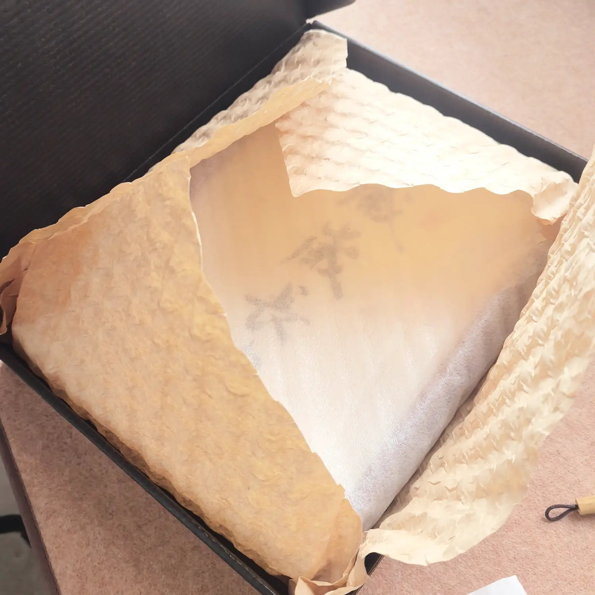 FEIverse Chinese calligraphy artwork protected in gift-ready packaging for safe delivery